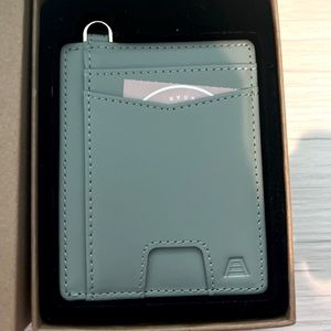 Brand New Never Used Denner Wallet in the color COVE! Only opened to take pic!